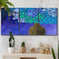 Three-panel canvas wall art featuring blue poppy floral abstraction, displayed in a boho-chic entryway above a console table.