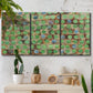Three-panel canvas wall art featuring geometric fractal abstract slot pattern, displayed in a boho-chic entryway above a console table.