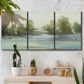 Three-panel canvas wall art featuring calming scenic landscape view, displayed in a boho-chic entryway above a console table.