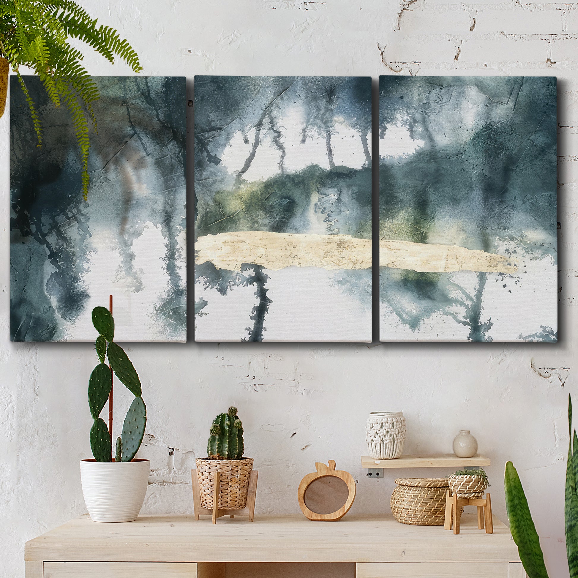 Three-panel canvas wall art featuring saturated abstract color fields, displayed in a boho-chic entryway above a console table.