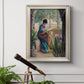 Impressionist portrait of Madame Monet sewing by Claude Monet in an ornate champagne frame displayed in a light-toned interior setting.