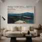 Canvas art print featuring a composition combining figure, water, and distant landscape, displayed in a spacious living room