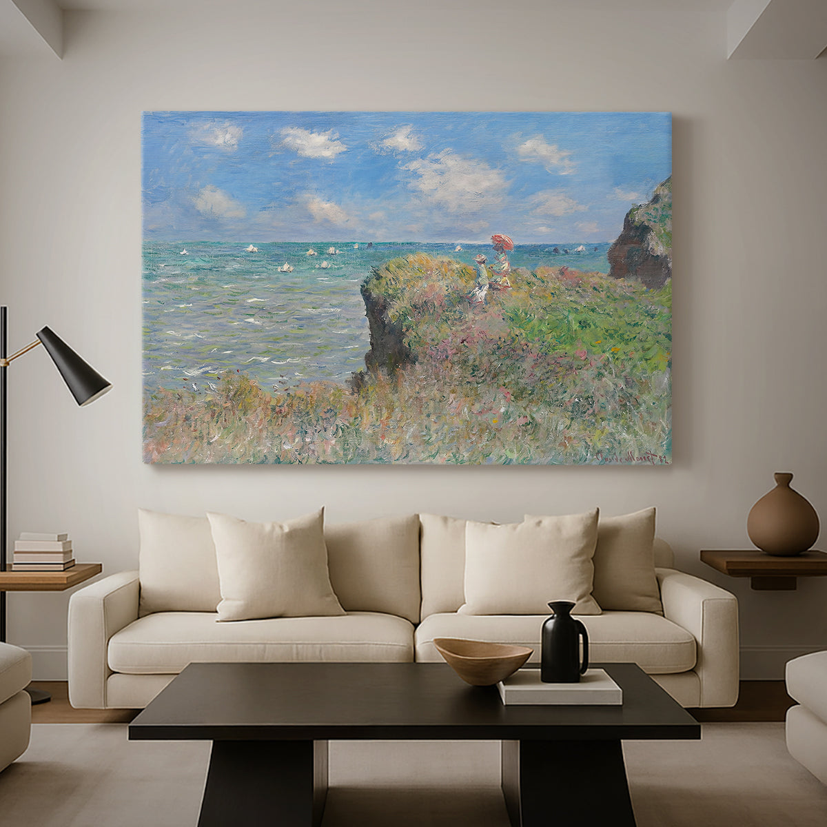 Canvas art print featuring a coastal cliff scene with grass, wind, and expansive sea view, displayed in a spacious living room