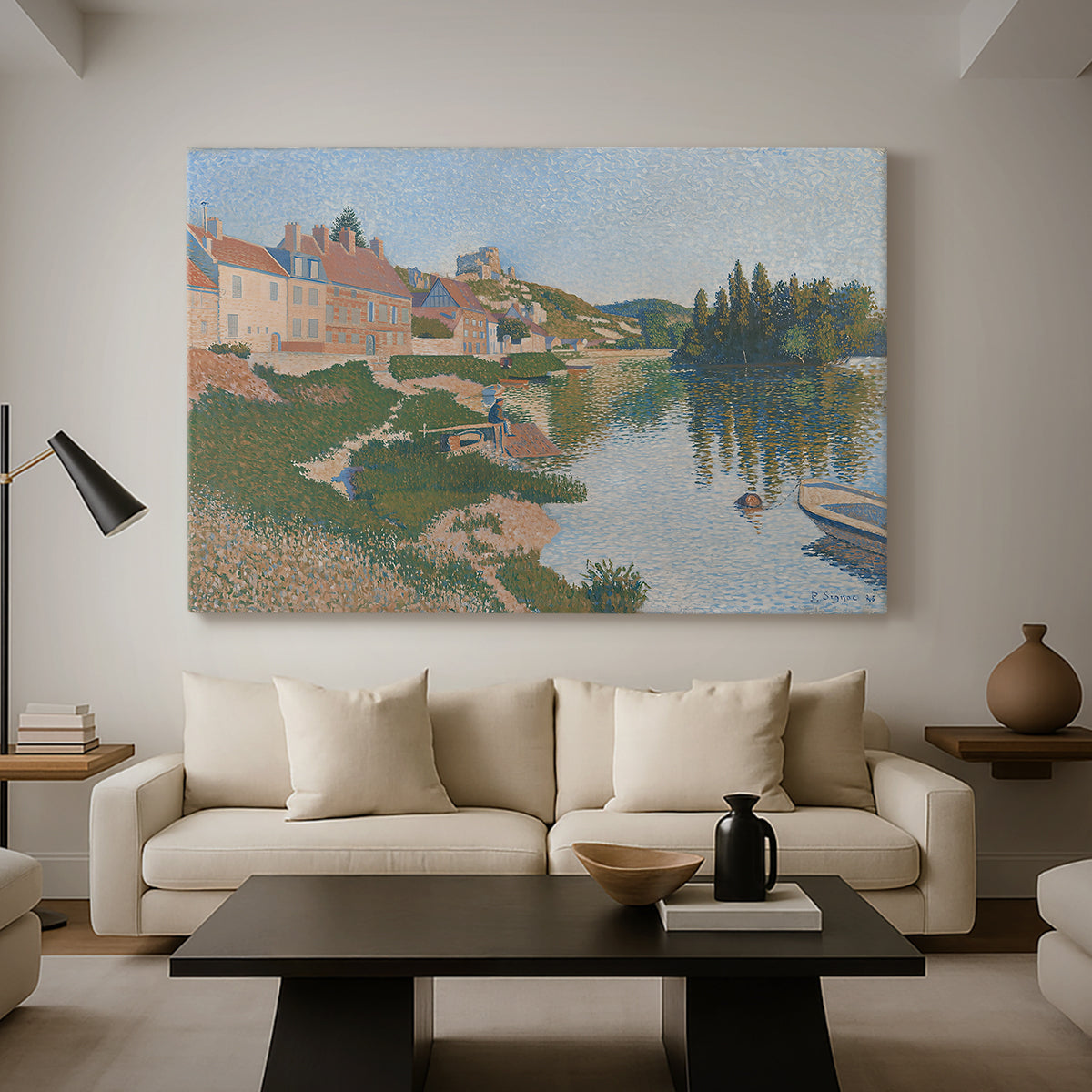Canvas art print featuring a pointillist town next to a riverbank, displayed in a spacious living room