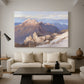Canvas art print featuring a high vantage point overlooking rugged mountain terrain, displayed in a spacious living room