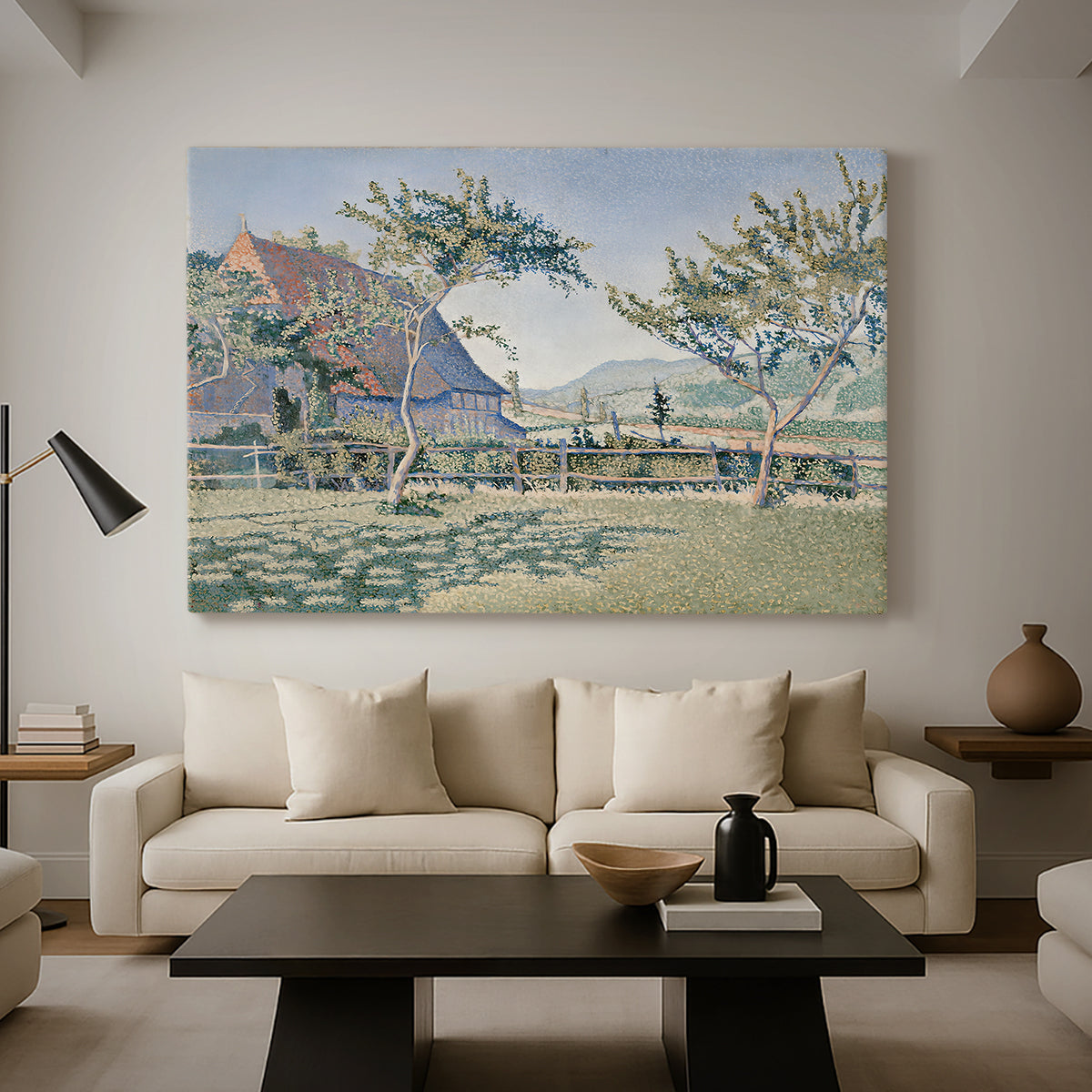 Canvas art print featuring a rural composition with houses and greenery, displayed in a spacious living room
