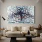 Canvas art print featuring a stylized linear tree, displayed in a spacious living room
