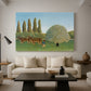 Canvas art print featuring a naïve landscape with animals and rolling greenery, displayed in a spacious living room