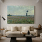 Canvas art print featuring a rural meadow with scattered poppies and soft horizon, displayed in a spacious living room