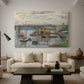 Canvas art print featuring a calm water scene with bridge fading into cloudy sky, displayed in a spacious living room