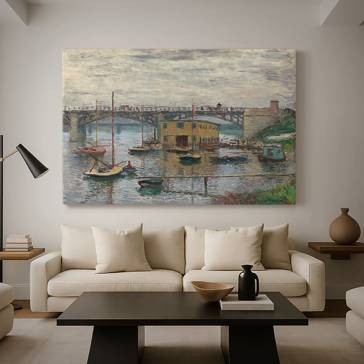 Canvas art print featuring a calm water scene with bridge fading into cloudy sky, displayed in a spacious living room