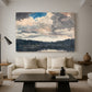 Canvas art print featuring a calm lake composition with trees reflected in water, displayed in a spacious living room