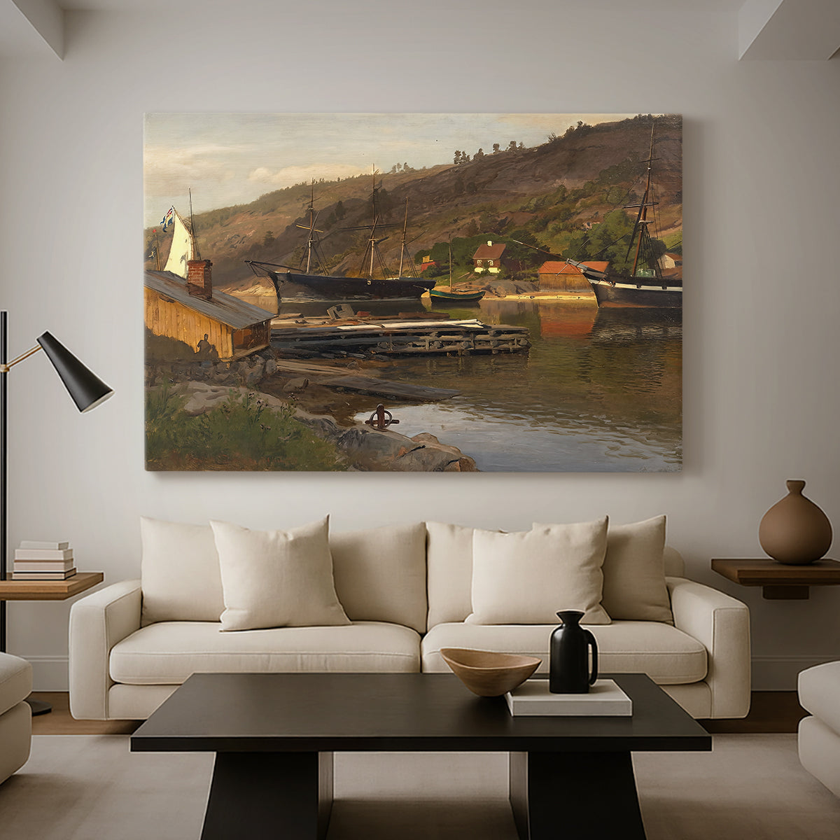 Canvas art print featuring a waterfront setting with village structures and reflections, displayed in a spacious living room