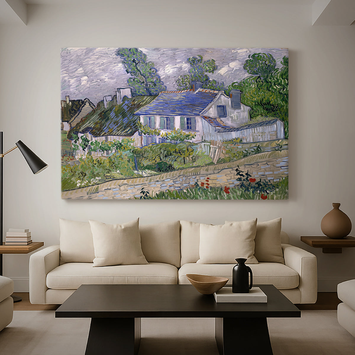 Canvas art print featuring a post-impressionist cityscape with rooftops and vegetation, displayed in a spacious living room