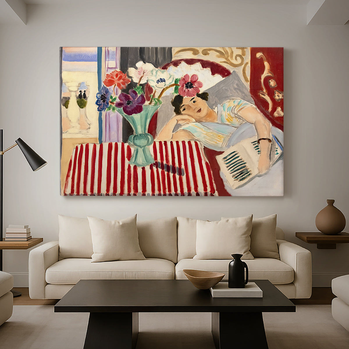 Canvas art print featuring an expressive interior with woman and bright flowers on table, displayed in a spacious living room