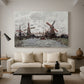 Canvas art print featuring a countryside scene with traditional windmills and reflections, displayed in a spacious living room