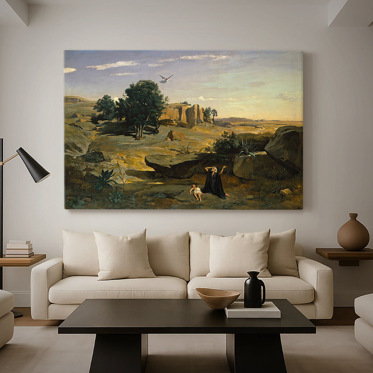 Canvas art print featuring an atmospheric landscape with lone figure and open space, displayed in a spacious living room
