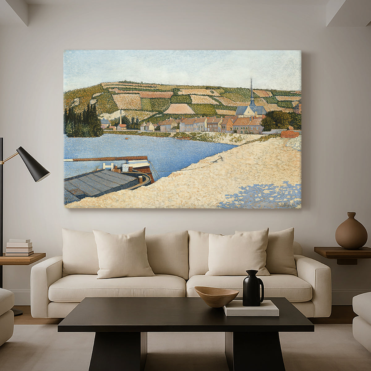 Canvas art print featuring a landscape with shoreline and architecture, displayed in a spacious living room