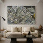 Canvas art print featuring an abstracted town view with angular rooftops and fragmented forms, displayed in a spacious living room
