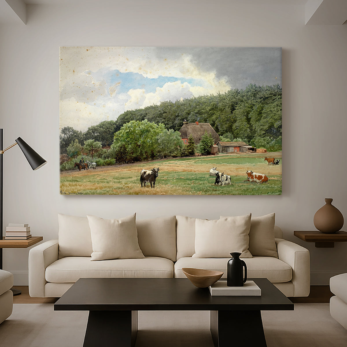 Canvas art print featuring a rural landscape with cows feeding on grass near buildings, displayed in a spacious living room
