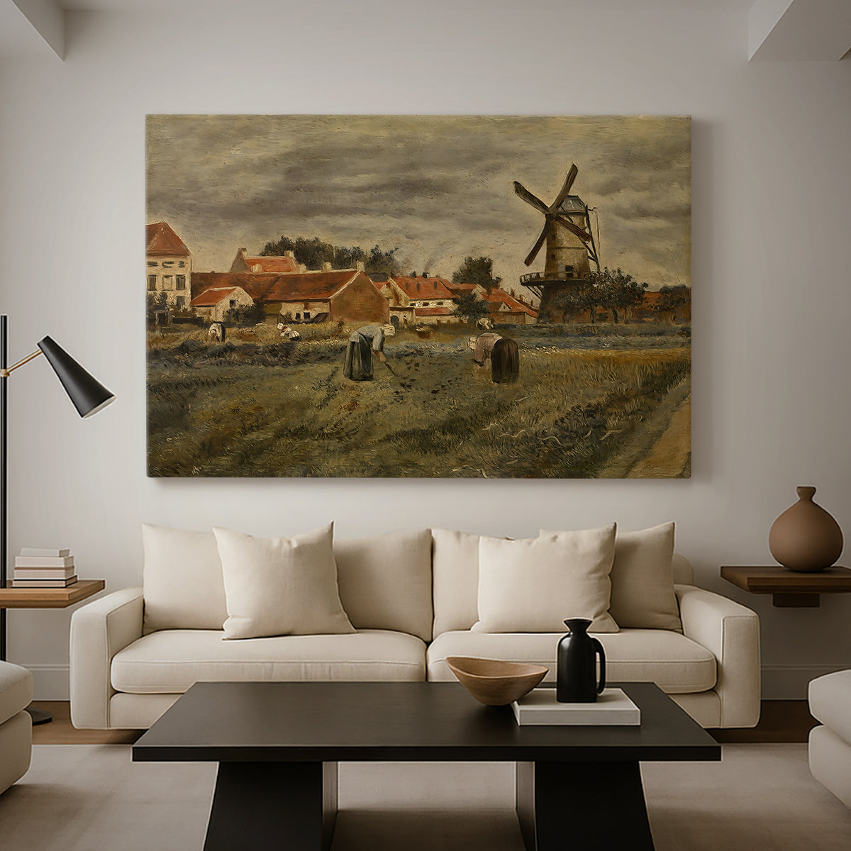 Canvas art print featuring a countryside composition with houses and working figures, displayed in a spacious living room