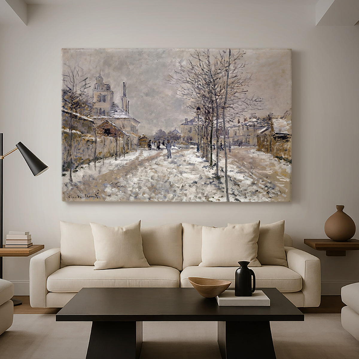 Canvas art print featuring a quiet boulevard blanketed in snow with distant figures, displayed in a spacious living room