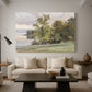 Canvas art print featuring a natural setting with water, trees, and open sky, displayed in a spacious living room