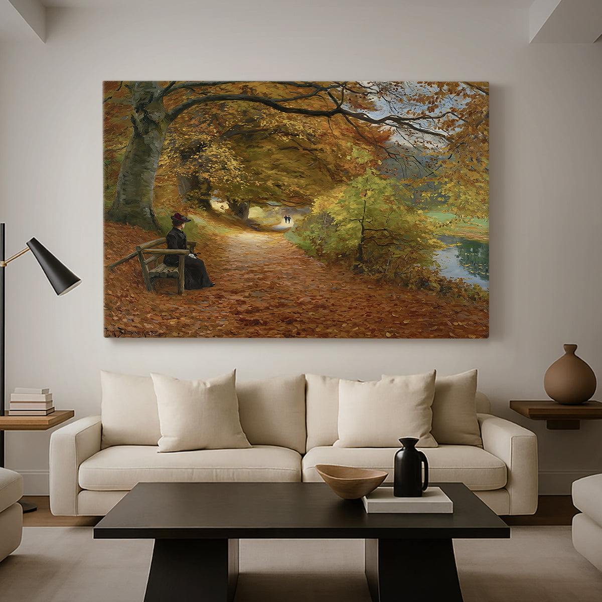 Canvas art print featuring a countryside path lined with trees and warm seasonal colors, displayed in a spacious living room