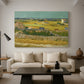 Canvas art print featuring an expressive landscape combining figures and farmland, displayed in a spacious living room