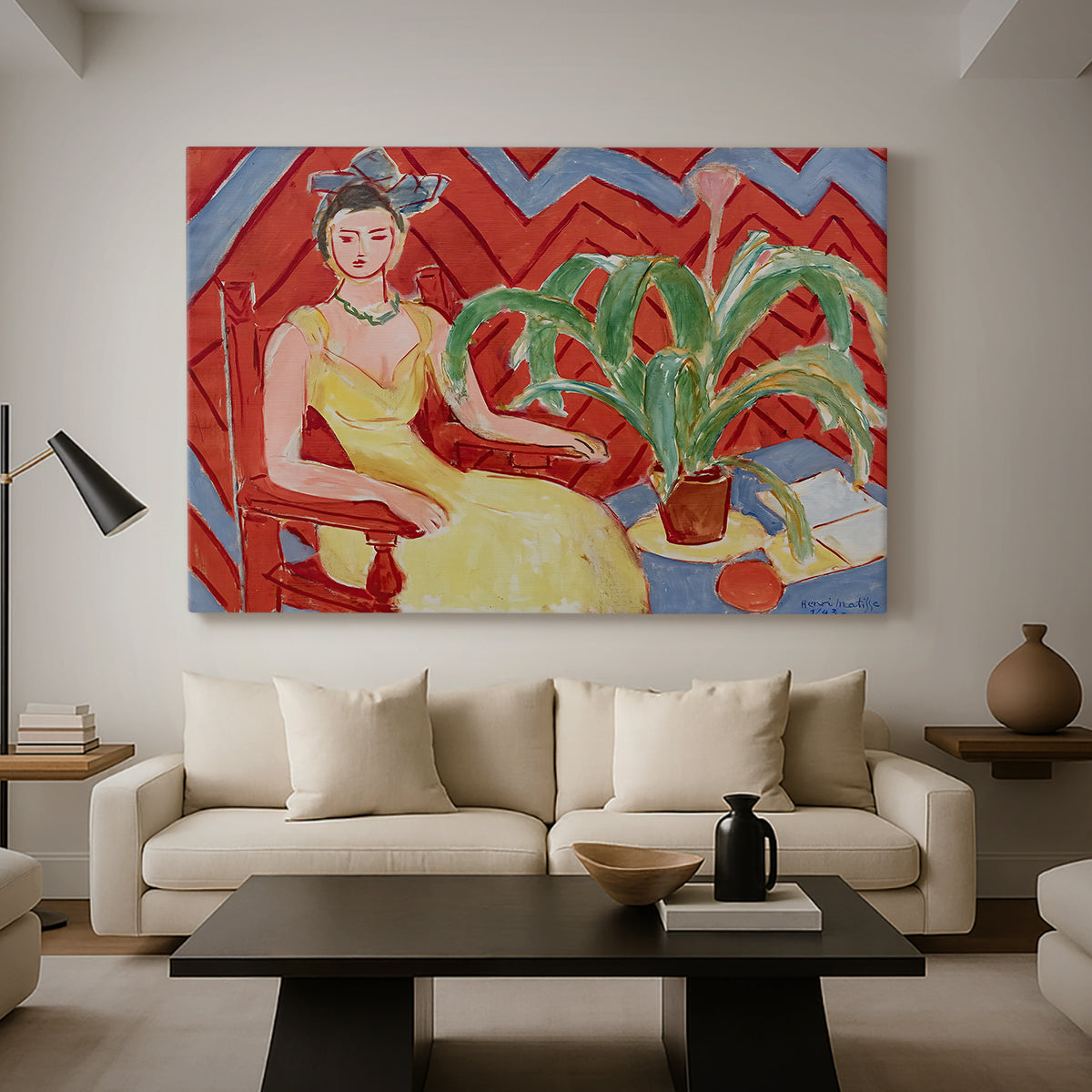Canvas art print featuring a stylized seated female figure in strong warm tones, displayed in a spacious living room