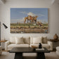 Canvas art print featuring a landscape featuring river, animals, and activity, displayed in a spacious living room