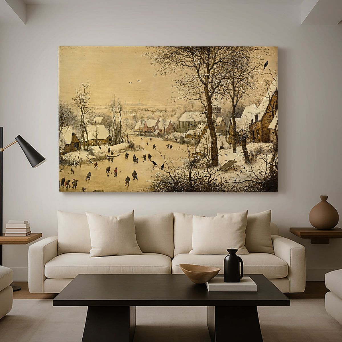 Canvas art print featuring a rustic village scene with skaters and snow-covered terrain, displayed in a spacious living room