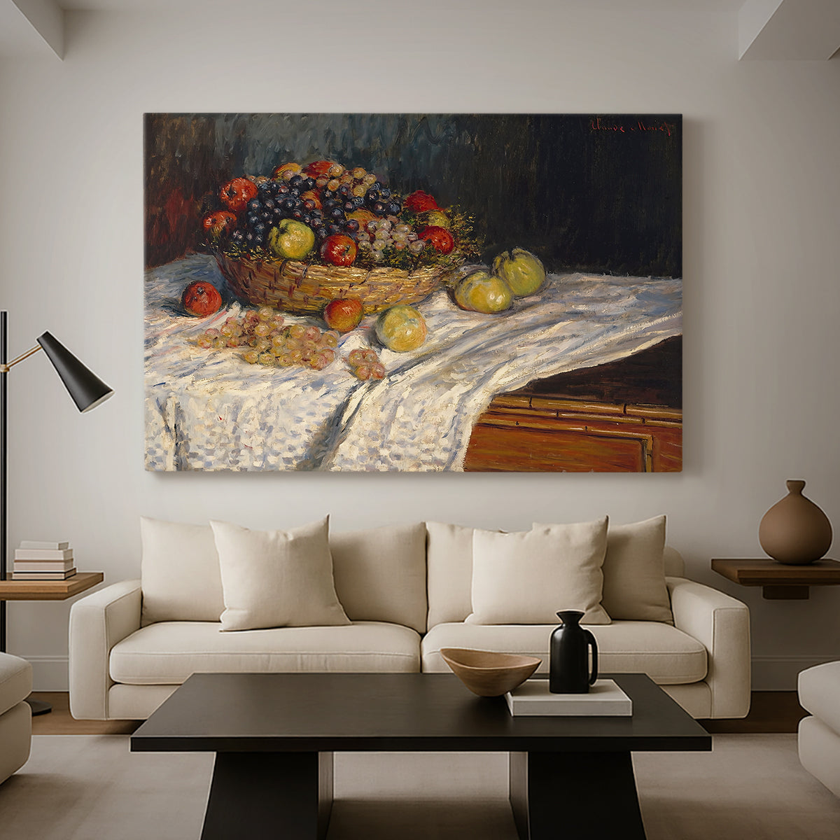 Canvas art print featuring a close-up of apples and grapes in warm tones, displayed in a spacious living room