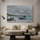 Canvas art print featuring a coastal landscape with sailboats and visitors on cliffside, displayed in a spacious living room