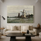 Canvas art print featuring a rustic scene with windmill and reflections in water, displayed in a spacious living room