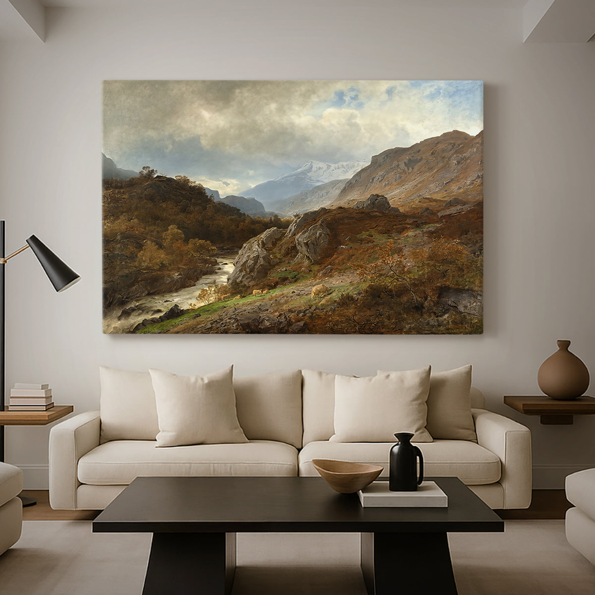 Canvas art print featuring a natural scene with elevation and layered mountains, displayed in a spacious living room