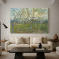 Canvas art print featuring a post-impressionist landscape emphasizing light and color, displayed in a spacious living room