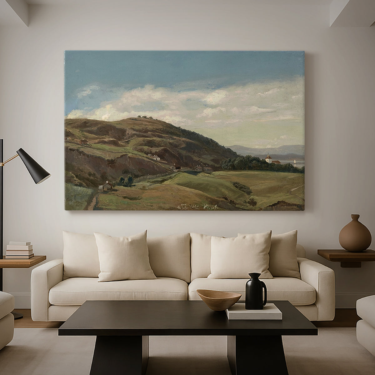 Canvas art print featuring a scenic landscape of Ekeberg hills with Oslo church and expansive sky, displayed in a spacious living room