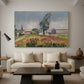 Canvas art print featuring a landscape with a river crossing and soft vegetation, displayed in a spacious living room