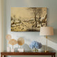 Canvas art print featuring a rustic village scene with skaters and snow-covered terrain, displayed above a styled console table