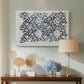 Canvas art print featuring a decorative composition featuring branching stems and leaves, displayed above a styled console table