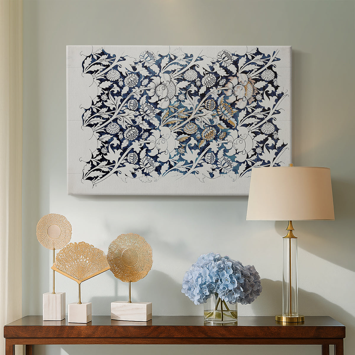 Canvas art print featuring a decorative composition featuring branching stems and leaves, displayed above a styled console table