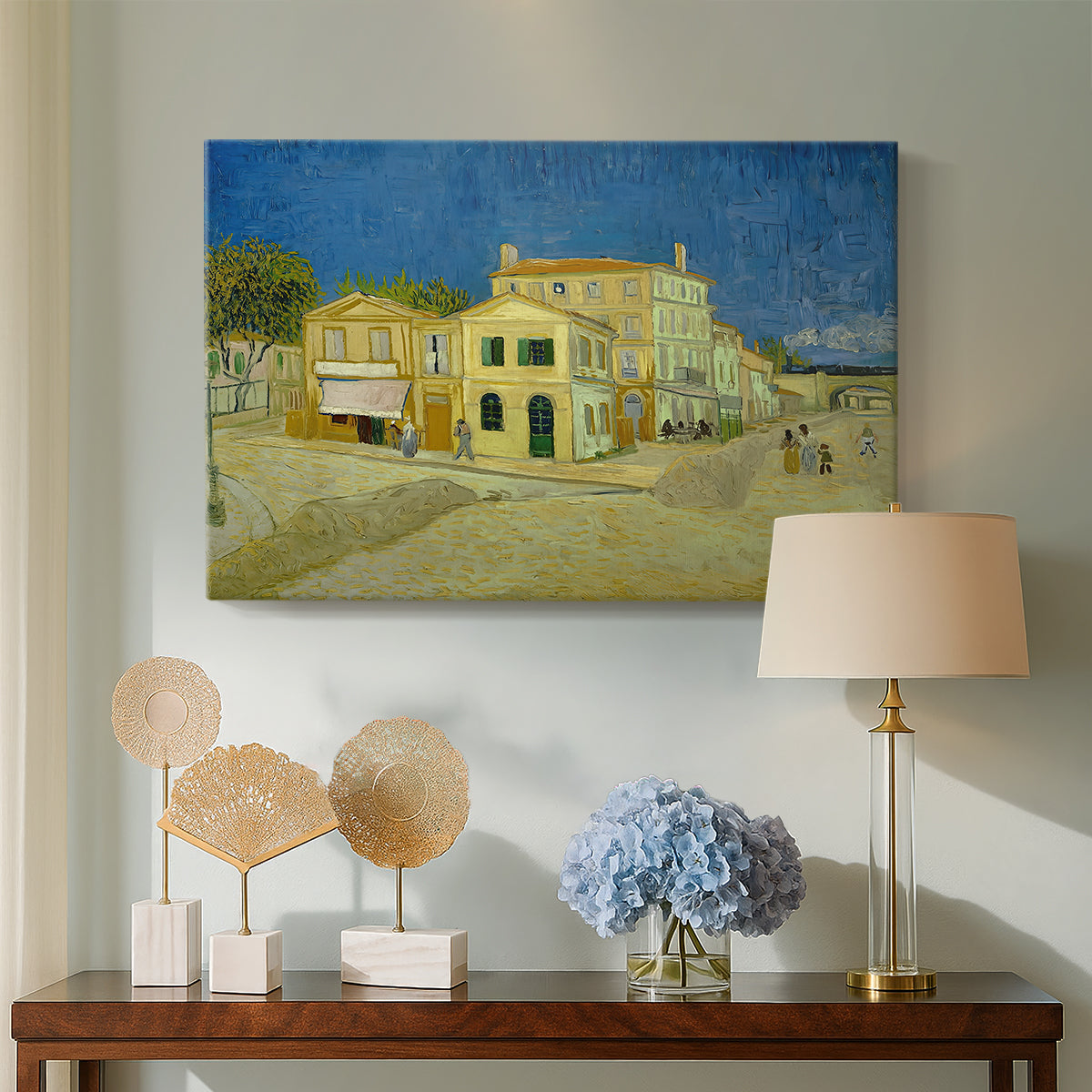 Canvas art print featuring an architectural composition featuring corner house and street, displayed above a styled console table