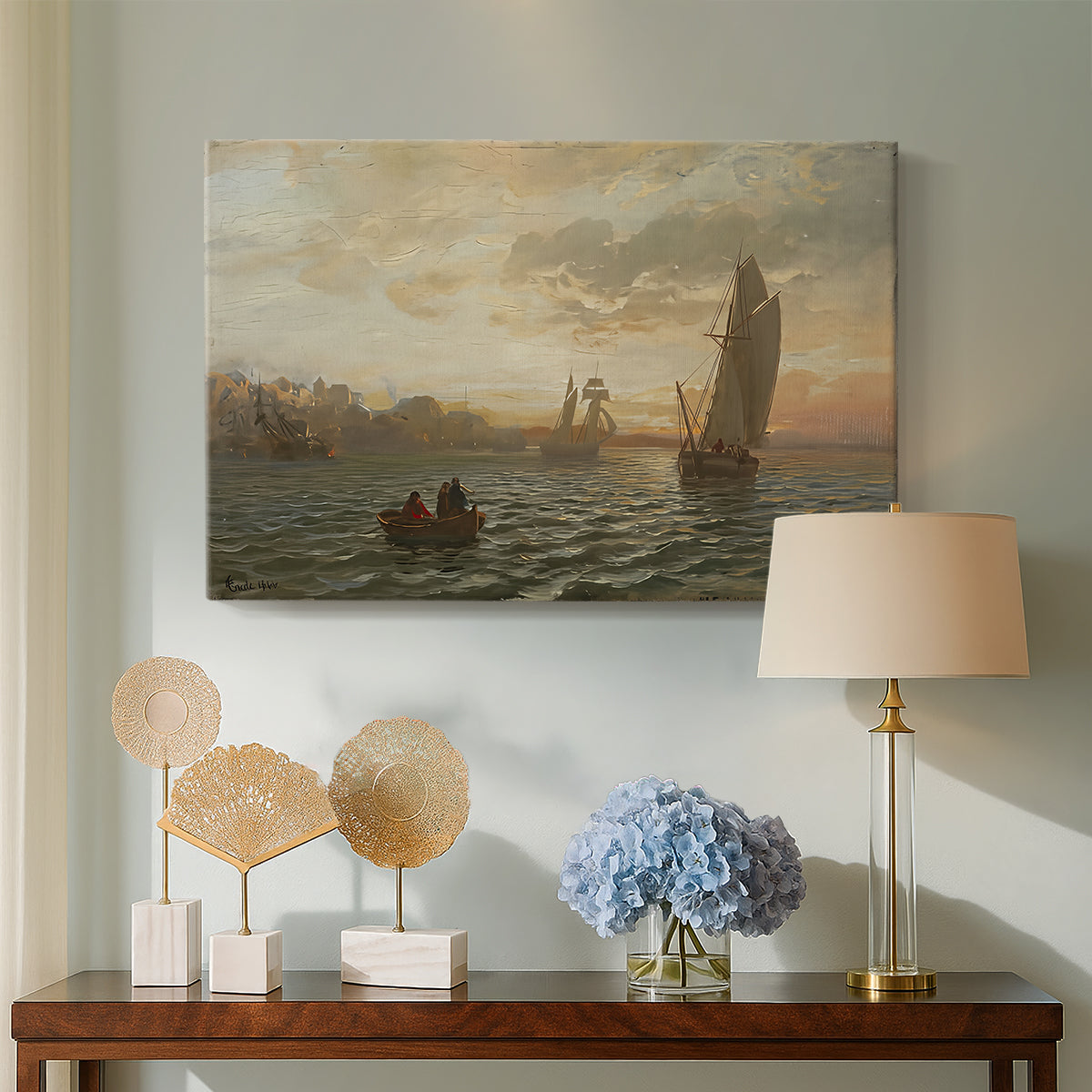 Canvas art print featuring a wide coastal composition with vessels and soft atmosphere, displayed above a styled console table