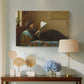 Canvas art print featuring an Americana interior with people focused on printed page, displayed above a styled console table