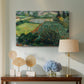 Canvas art print featuring a post-impressionist scene emphasizing color contrast, displayed above a styled console table
