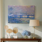 Canvas art print featuring an atmospheric depiction of London bridge with reflections in water, displayed above a styled console table