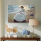 Canvas art print featuring an impressionist figure study with ocean backdrop, displayed above a styled console table
