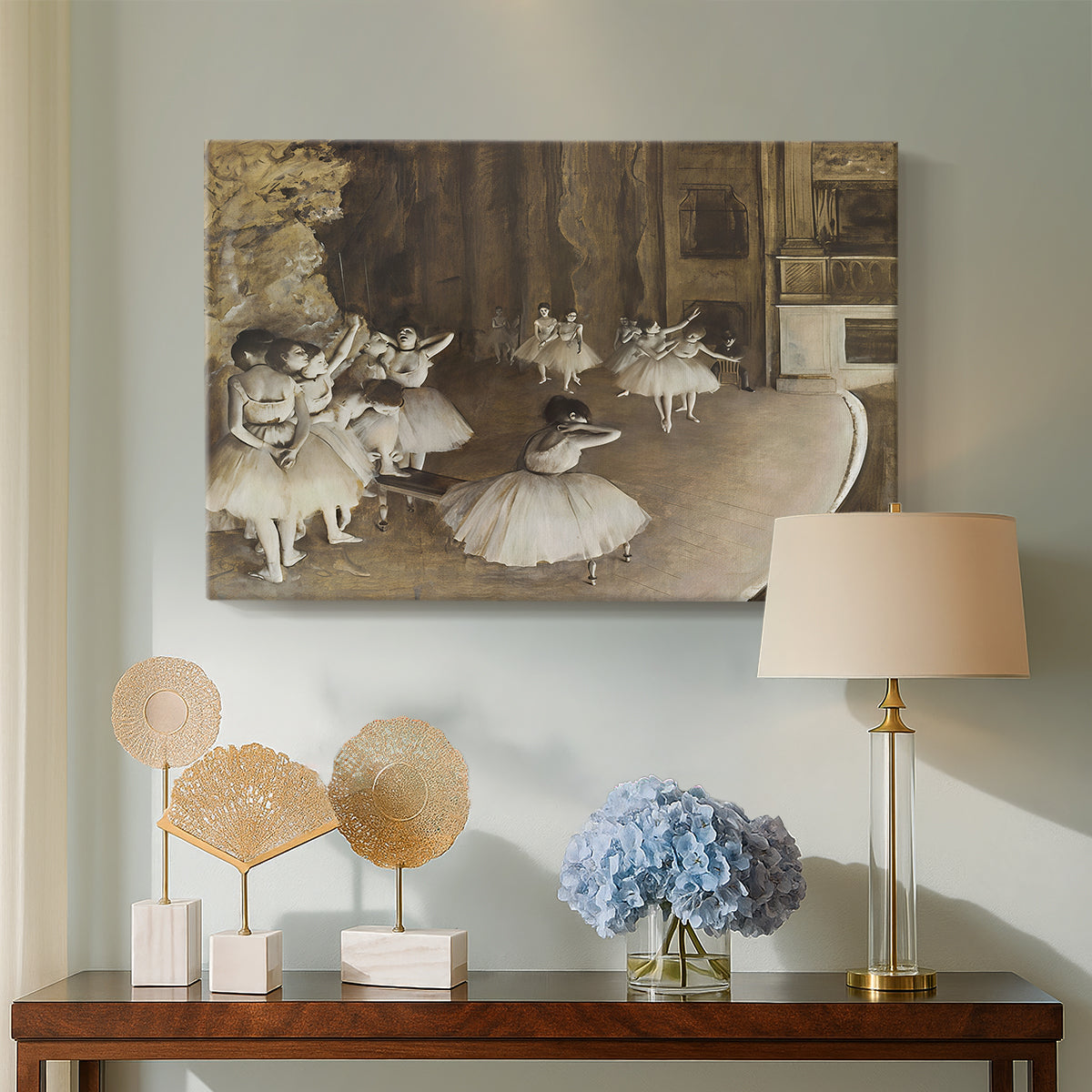 Canvas art print featuring an impressionist depiction of ballet practice on theater stage, displayed above a styled console table