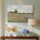Canvas art print featuring a bright meadow filled with poppies under open sky, displayed above a styled console table